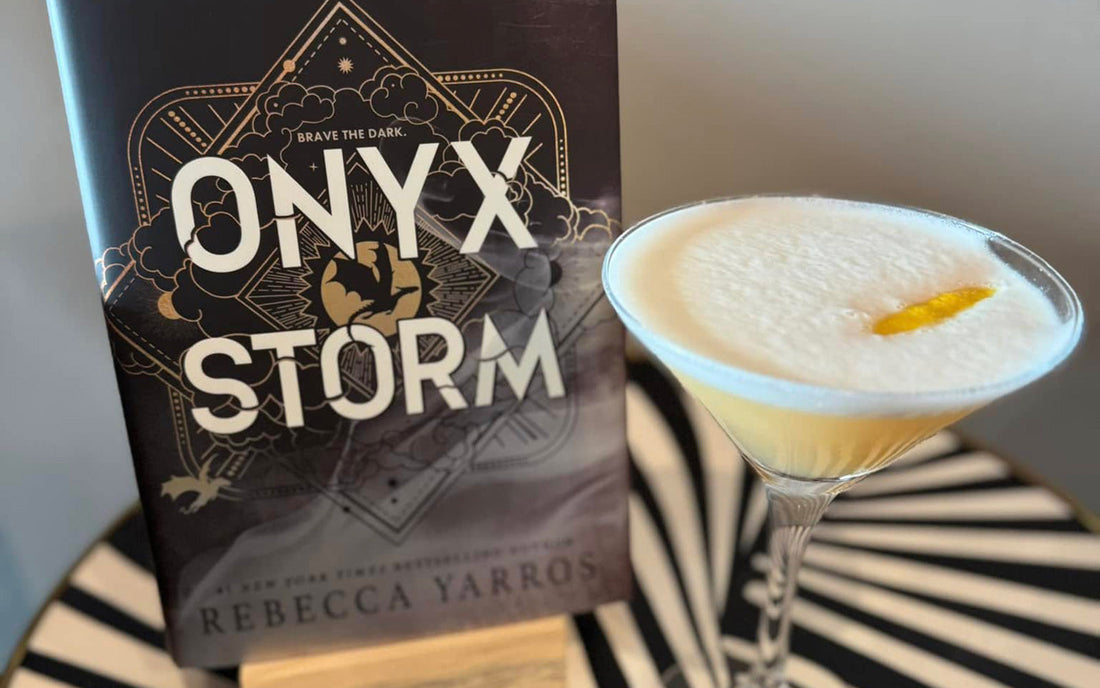 Onyx Storm by Rebecca Yarros paired with a cocktail