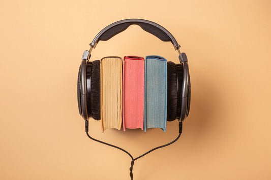 Three books with headphones