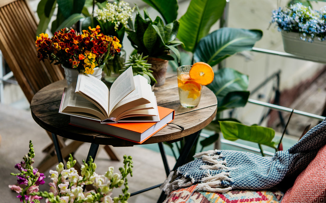 Books surrounded by plants