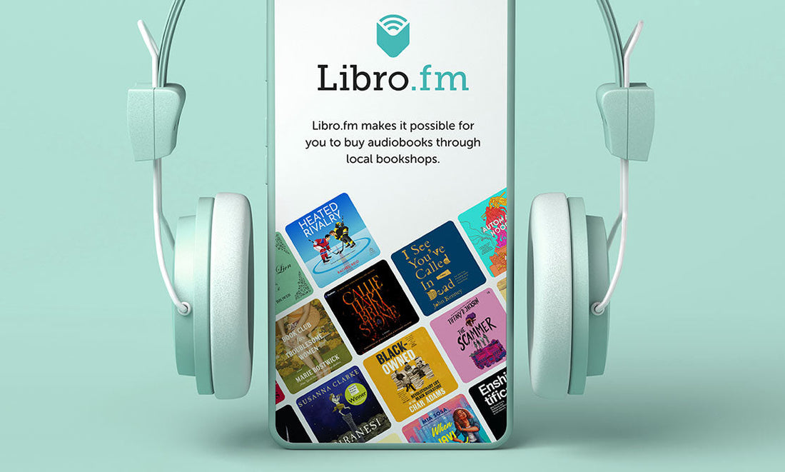 Audiobook app on phone with headphones