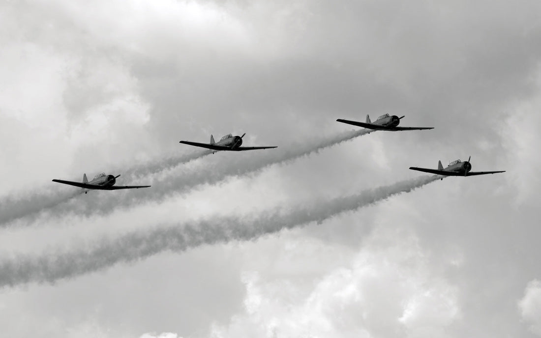 Four WWII planes flying